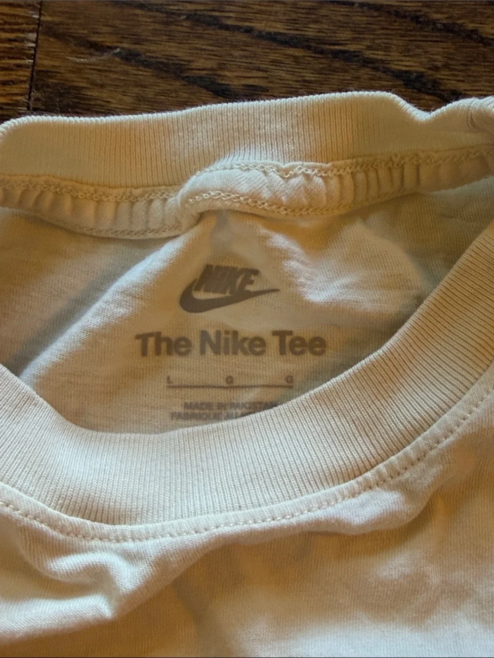 Nike White Tee with Orange Graphic & Green Stripe